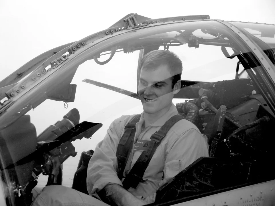 Maxwell Duke at the controls of an aircraft